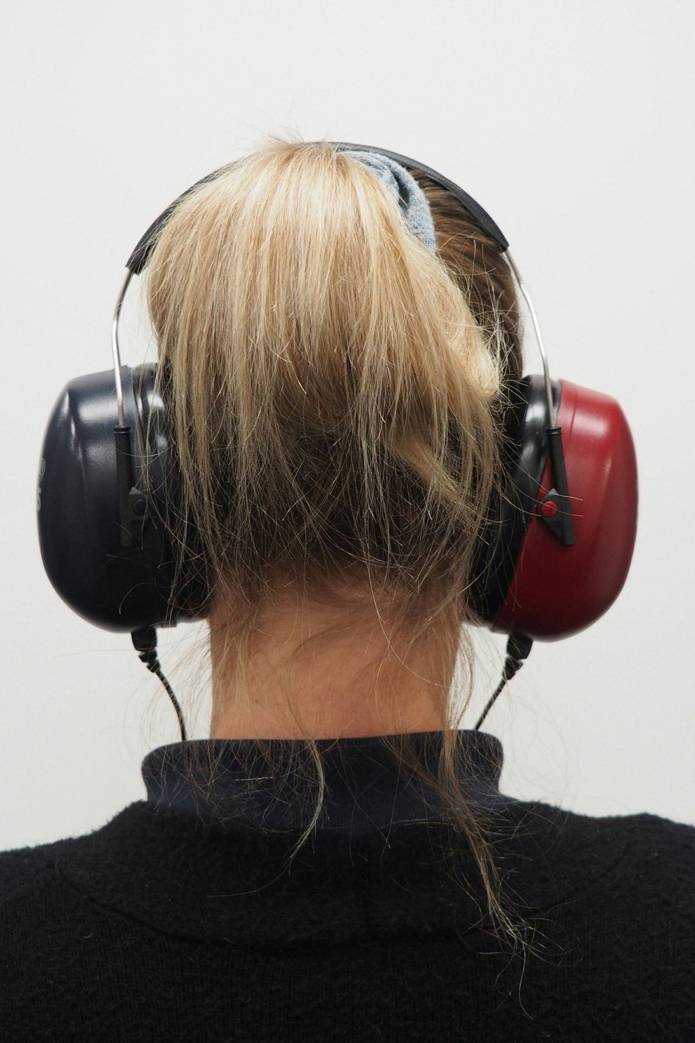 A worker wearing ear defenders, the personal protection that sits alongside audiometry where noise exceeds the exposure action values