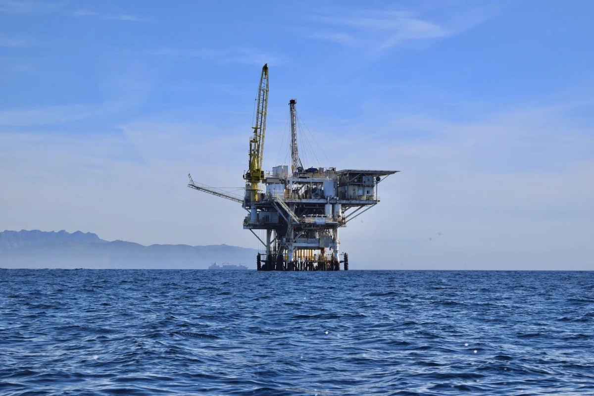 An offshore production platform on a calm sea, the working environment an OEUK medical certifies fitness for